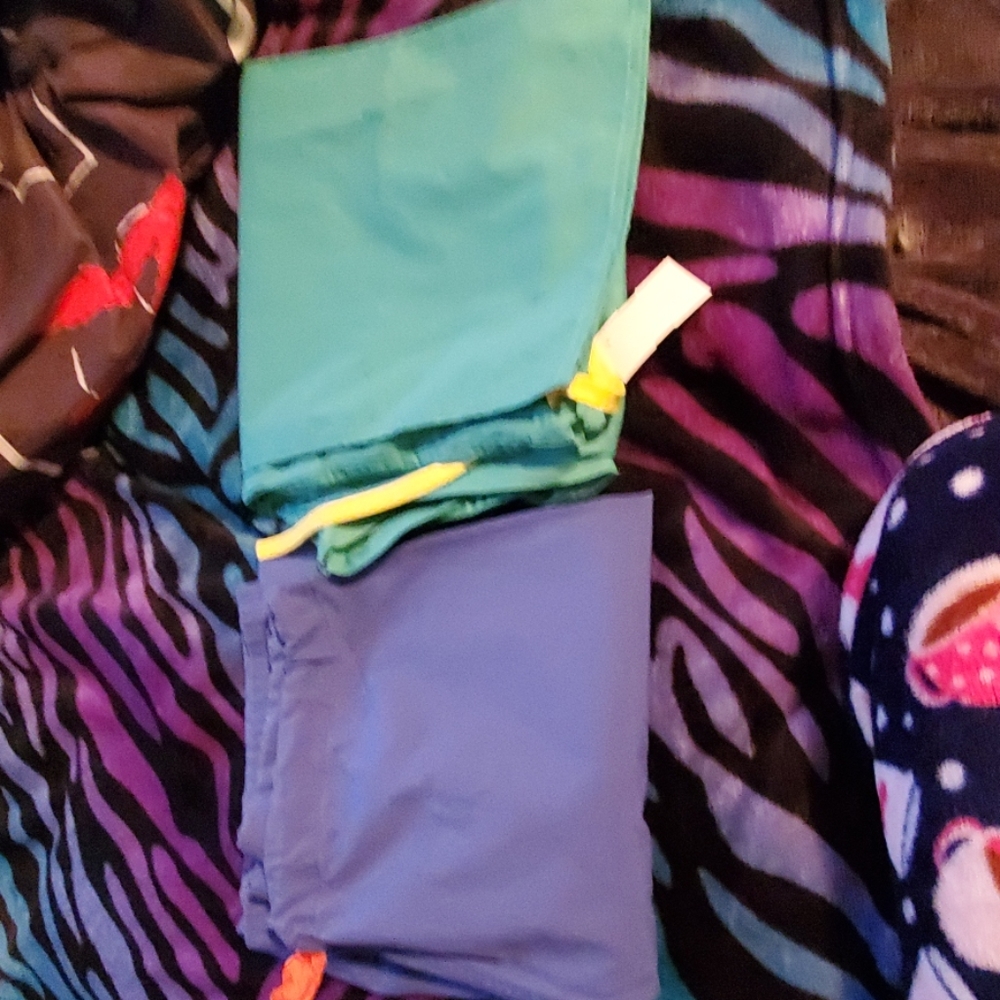 Scrub pants both together